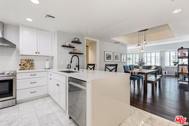 Dining room, Interior, Kitchen, Marble, Pendant Lights, Recessed Lighting, Stainless Steel Appliances, Wood Texture Flooring