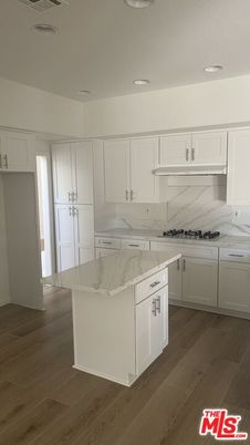 Interior, Kitchen, Marble Walls, Recessed Lighting, Wood Texture Flooring