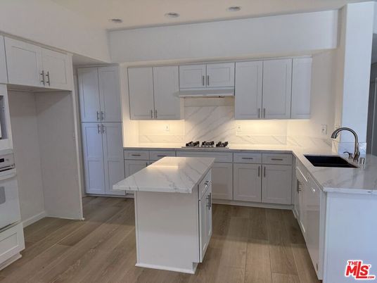 Interior, Kitchen, Marble Walls, Recessed Lighting, Wood Texture Flooring