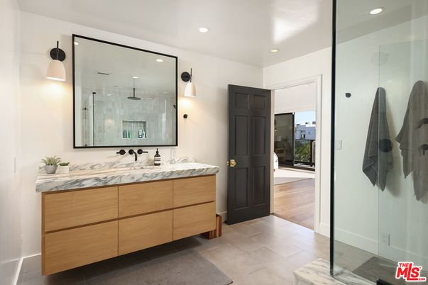 Bathroom, Dual Sink Vanities, Glass Shower, Interior, Recessed Lighting, Wood Texture Flooring