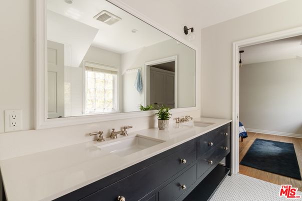 Bathroom, Dual Sink Vanities, Interior, Recessed Lighting, Wood Texture Flooring