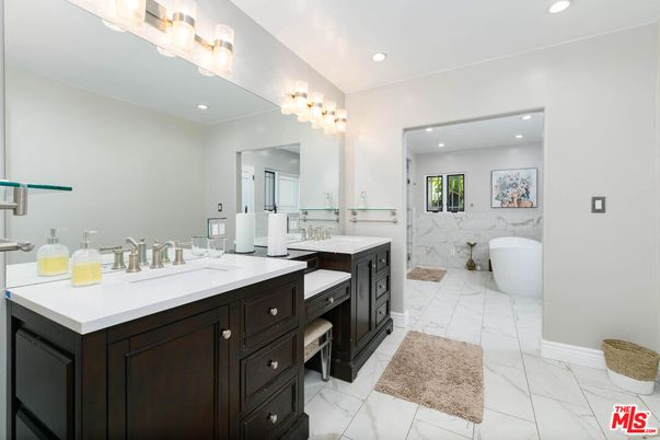 Bathroom, Dual Sink Vanities, Free Standing Baths, Interior, Marble, Marble Walls, Recessed Lighting