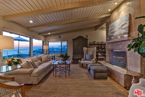 Fireplace, Interior, Living room, Recessed Lighting, Water, Wooden Beams