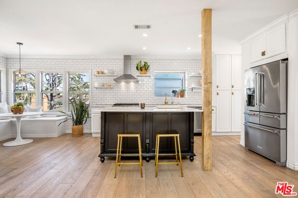 Interior, Kitchen, Pendant Lights, Recessed Lighting, Stainless Steel Appliances, Stone Walls, Wood Texture Flooring