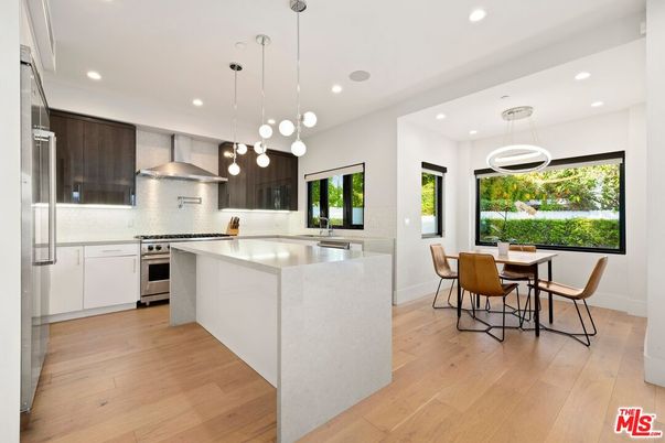 Dining room, Interior, Kitchen, Pendant Lights, Recessed Lighting, Stainless Steel Appliances, Wood Texture Flooring