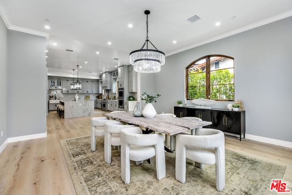 Chandelier, Dining room, Interior, Kitchen, Pendant Lights, Recessed Lighting, Stainless Steel Appliances, Wood Texture Flooring