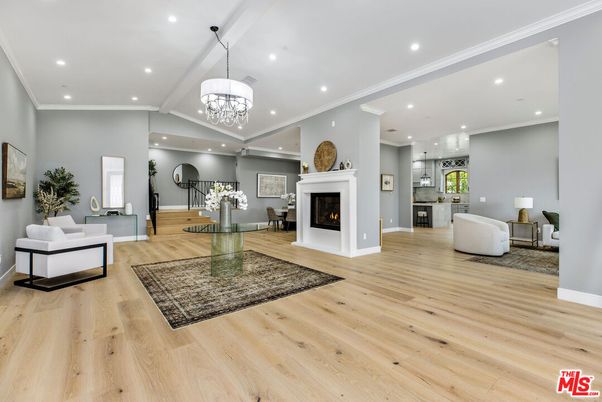 Chandelier, Fireplace, Interior, Living room, Pendant Lights, Recessed Lighting, Wood Texture Flooring