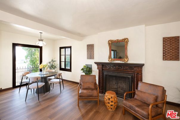 Dining room, Fireplace, Interior, Pendant Lights, Wood Texture Flooring