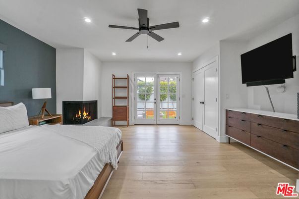 Bedroom, Fireplace, Interior, Recessed Lighting, Wood Texture Flooring