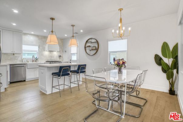 Dining room, Interior, Kitchen, Pendant Lights, Recessed Lighting, Stainless Steel Appliances, Wood Texture Flooring
