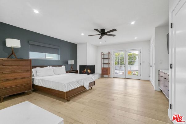 Bedroom, Fireplace, Interior, Recessed Lighting, Wood Texture Flooring