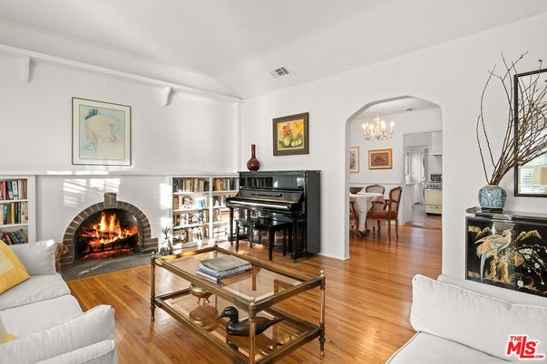 Chandelier, Dining room, Fireplace, Interior, Living room, Piano, Wood Texture Flooring