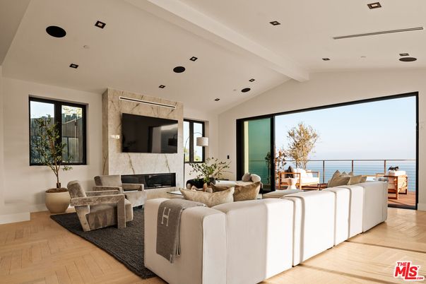 Fireplace, Interior, Living room, Recessed Lighting, Water, Wood Texture Flooring