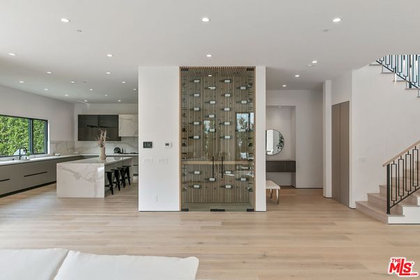 Interior, Kitchen, Marble Walls, Recessed Lighting, Stainless Steel Appliances, Wood Texture Flooring