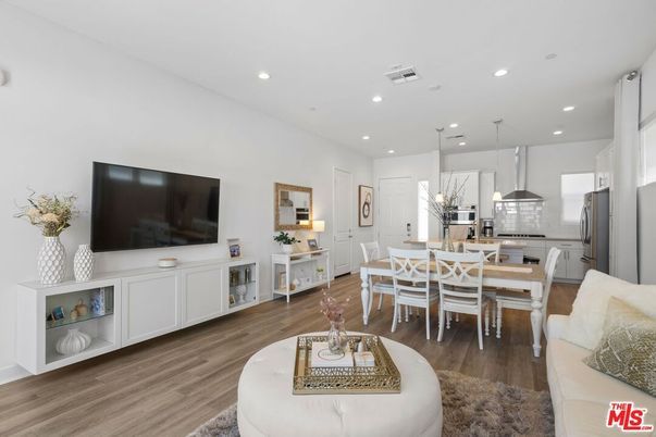 Dining room, Interior, Kitchen, Living room, Pendant Lights, Recessed Lighting, Stainless Steel Appliances, Wood Texture Flooring