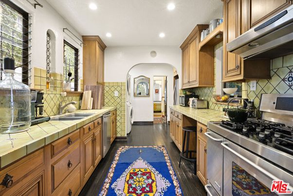 Interior, Kitchen, Recessed Lighting, Stainless Steel Appliances, Tile Countertops, Wood Texture Flooring