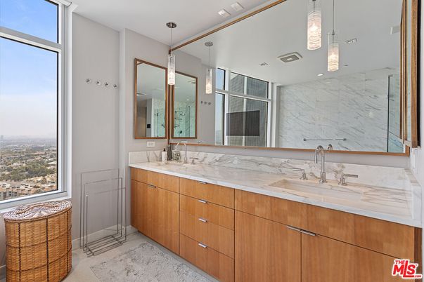 Bathroom, Dual Sink Vanities, Interior, Marble Walls, Pendant Lights, Recessed Lighting