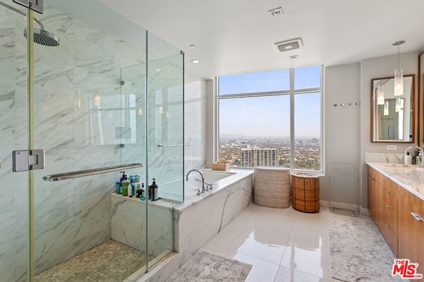 Bathroom, Dual Sink Vanities, Glass Shower, Interior, Marble Walls, Pendant Lights, Recessed Lighting