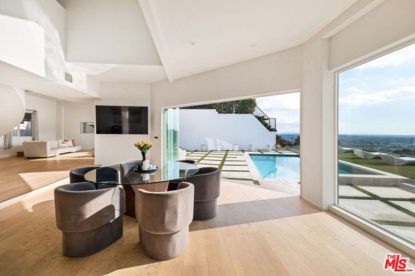 Dining room, Interior, Pool, Recessed Lighting, Water, Wood Texture Flooring