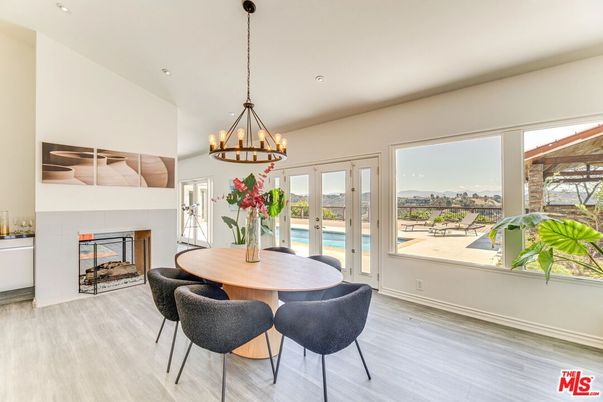 Chandelier, Dining room, Fireplace, Interior, Pendant Lights, Recessed Lighting, Wood Texture Flooring