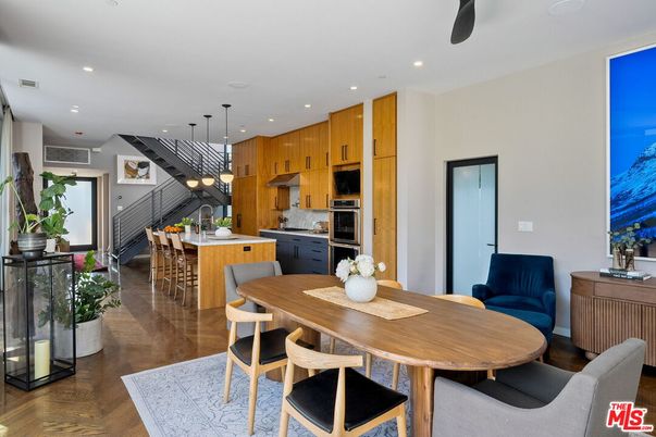 Dining room, Interior, Kitchen, Pendant Lights, Recessed Lighting, Stainless Steel Appliances, Wood Texture Flooring