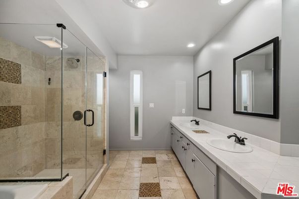 Bathroom, Dual Sink Vanities, Glass Shower, Interior, Recessed Lighting, Tile Countertops