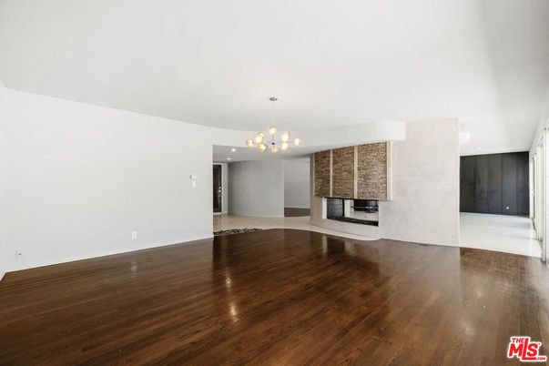 Chandelier, Empty room, Fireplace, Interior, Wood Texture Flooring