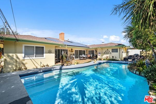 Exterior, Pool, Solar Panels