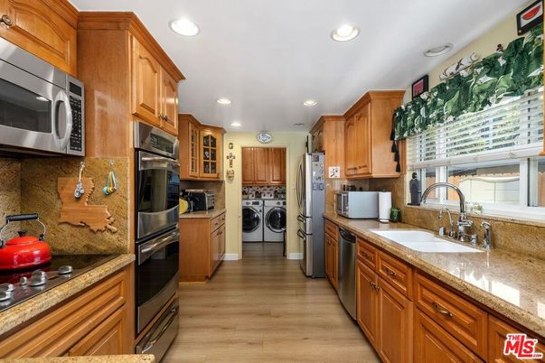 Interior, Kitchen, Recessed Lighting, Stainless Steel Appliances, Washer, Wood Texture Flooring