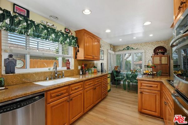Dining room, Interior, Kitchen, Recessed Lighting, Stainless Steel Appliances, Wood Texture Flooring