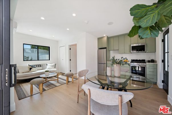 Dining room, Interior, Kitchen, Living room, Recessed Lighting, Stainless Steel Appliances, Wood Texture Flooring