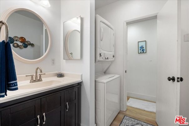 Bathroom, Dual Sink Vanities, Interior, Washer, Wood Texture Flooring