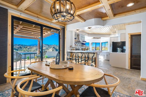 Chandelier, Dining room, Interior, Kitchen, Pendant Lights, Recessed Lighting, Water, Wooden Beams, Wooden Ceilings