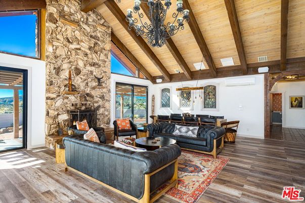 Dining room, Fireplace, Interior, Living room, Pendant Lights, Stone Walls, Wooden Beams, Wooden Ceilings, Wood Texture Flooring