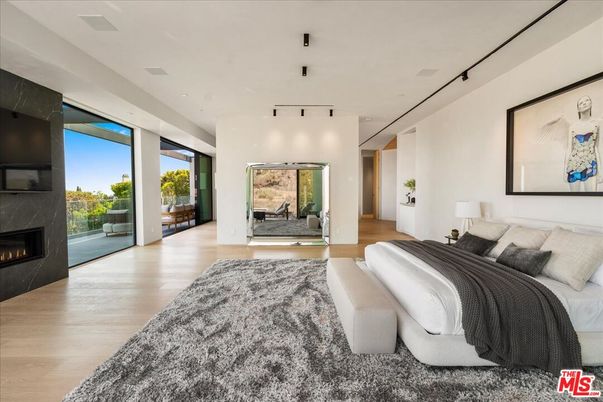 Bedroom, Fireplace, Interior, Recessed Lighting, Wood Texture Flooring