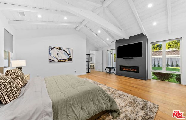 Bedroom, Fireplace, Interior, Recessed Lighting, Wood Texture Flooring