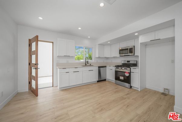 Interior, Kitchen, Recessed Lighting, Stainless Steel Appliances, Wood Texture Flooring
