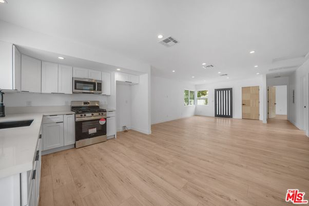 Interior, Kitchen, Recessed Lighting, Stainless Steel Appliances, Wood Texture Flooring