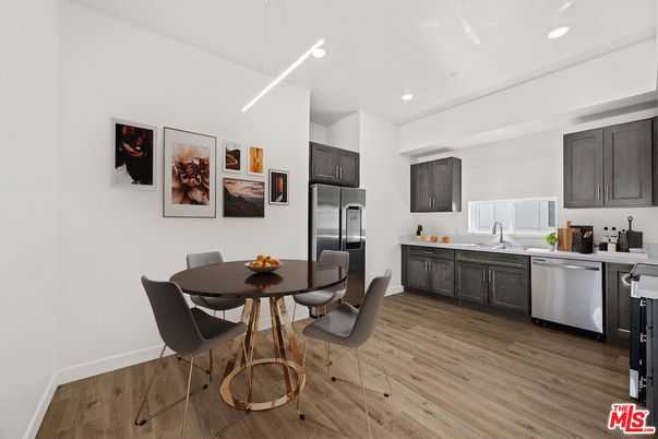 Dining room, Interior, Kitchen, Recessed Lighting, Stainless Steel Appliances, Wood Texture Flooring
