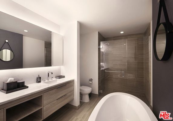 Bathroom, Dual Sink Vanities, Free Standing Baths, Glass Shower, Interior, Recessed Lighting, Wood Texture Flooring