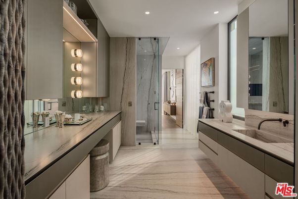 Bathroom, Dual Sink Vanities, Glass Shower, Interior, Marble, Marble Walls, Recessed Lighting, Wood Texture Flooring