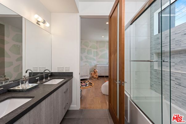 Bathroom, Dual Sink Vanities, Glass Shower, Interior, Recessed Lighting, Wood Texture Flooring