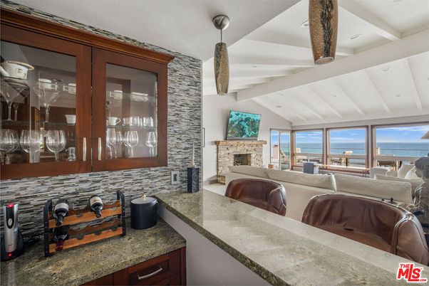 Fireplace, Interior, Living room, Pendant Lights, Recessed Lighting, Stone Walls, Water
