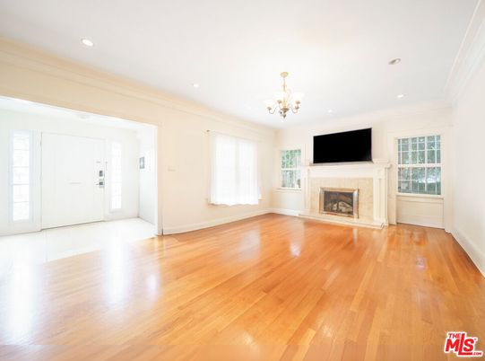 Chandelier, Empty room, Fireplace, Interior, Recessed Lighting, Wood Texture Flooring