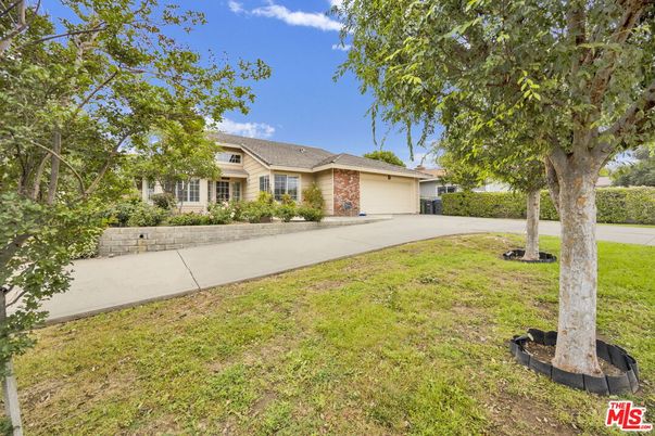 Attached, Backyard, Exterior, Facade, Brick Facade, Ranch