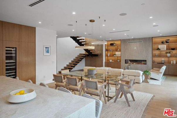 Dining room, Fireplace, Interior, Kitchen, Living room, Pendant Lights, Recessed Lighting, Wood Texture Flooring, Wooden Walls