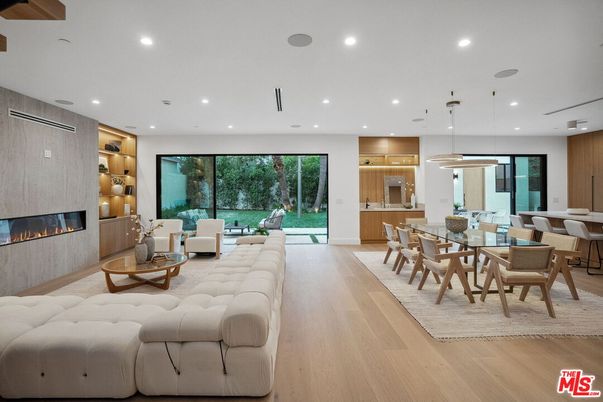 Dining room, Fireplace, Interior, Living room, Pendant Lights, Recessed Lighting, Wood Texture Flooring