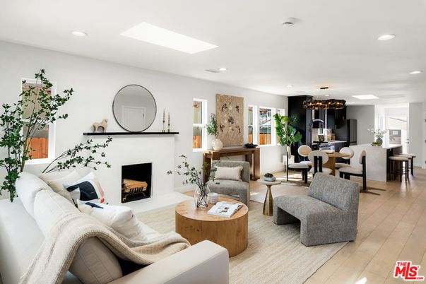 Dining room, Fireplace, Interior, Living room, Recessed Lighting, Wood Texture Flooring