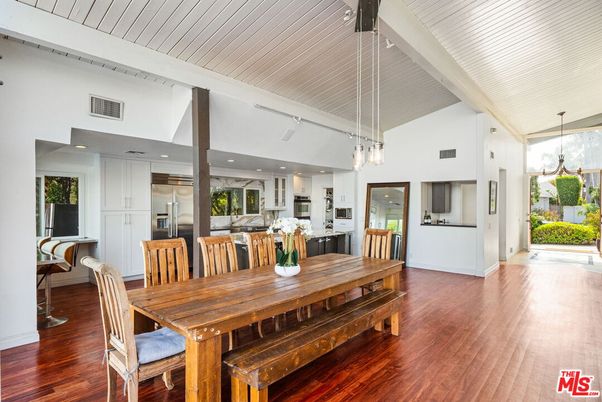 Chandelier, Dining room, Interior, Kitchen, Pendant Lights, Recessed Lighting, Stainless Steel Appliances, Wood Texture Flooring