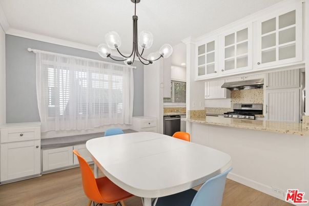 Chandelier, Dining room, Interior, Kitchen, Pendant Lights, Recessed Lighting, Stainless Steel Appliances, Wood Texture Flooring